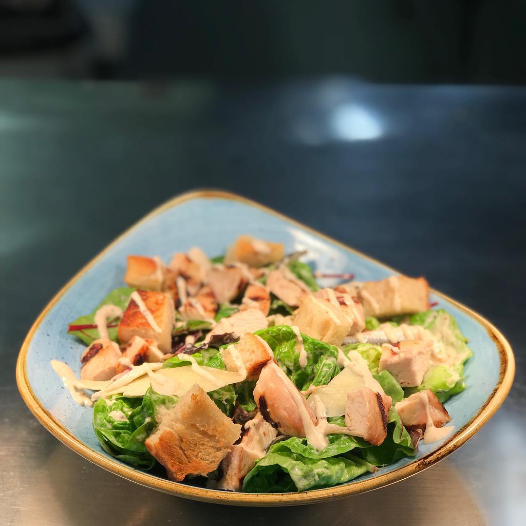 Ooooft. Bit of Caesar Salad action! A popular special this weekend! .
.
#ceasarsalad #chicken #anchovies #croutons #lettuce #salad #isithealthy #cafeoswalds #cranstons #cumbria #lakedistrict #penrith #carlisle